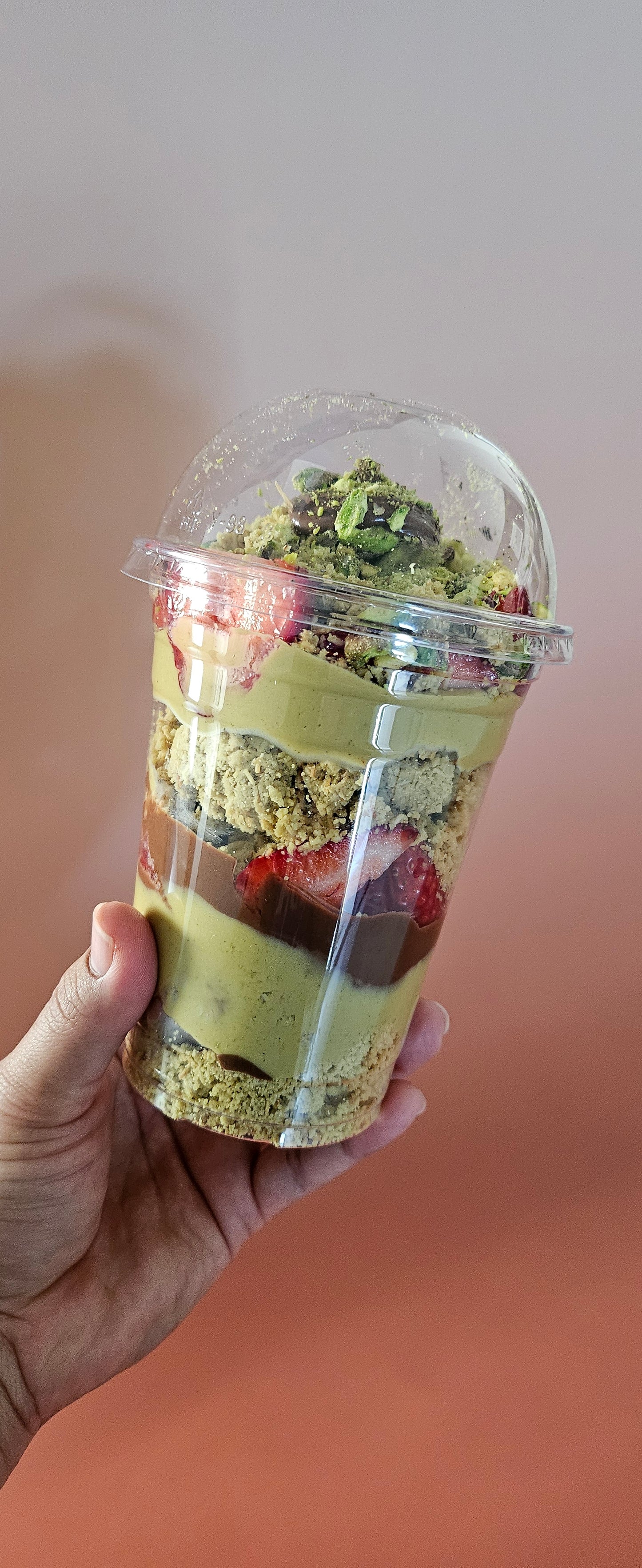 Layered Dubai chocolate strawberry cup with pistachio kataifi and Nutella