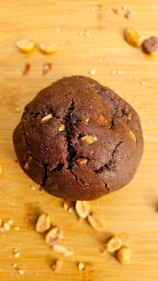 "Freshly baked Snicker cookie with a soft center filled with luscious caramel and creamy peanut butter chips."
